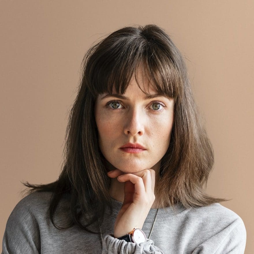 model posing in a studio e1620336883618